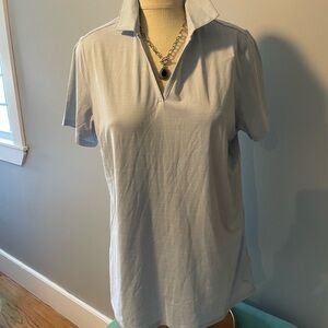 Women's sky blue puma golf shirt . New with tags